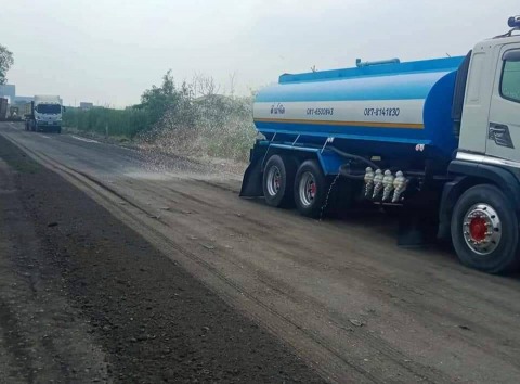 บริการฉีดพ่นน้ำไล่ฝุ่นพื้นถนน